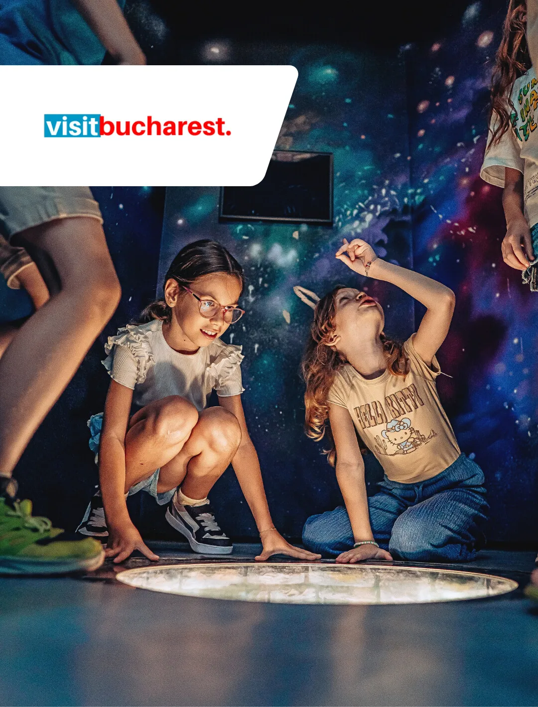 Playful visitors inside the Museum of Senses Bucharest.